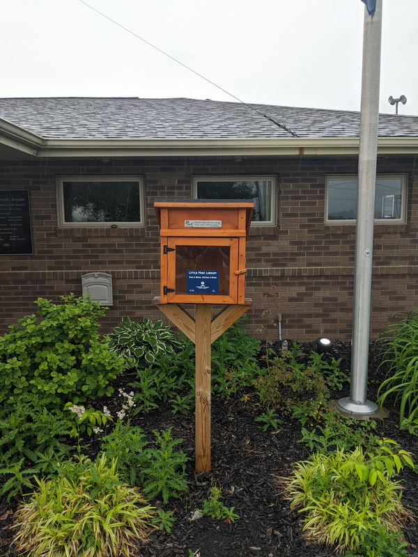 Little library at the Milton Municipal Building.